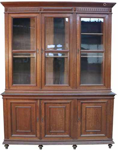 An oakwood library cabinet. France, circa 1900.