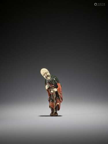 A SUPERB AND RARE LACQUERED IVORY NETSUKE OF GAMA …