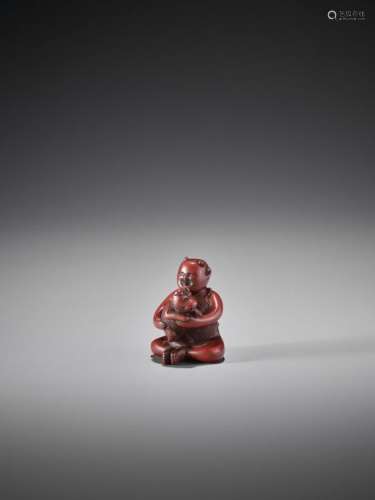 A RARE TSUISHU LACQUER NETSUKE OF A KARAKO WITH PU…