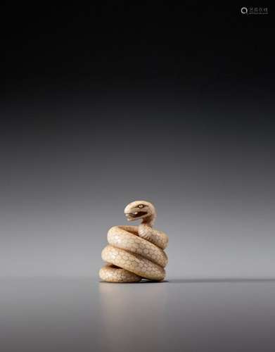 MASANAO: AN IVORY NETSUKE OF A COILED SNAKE Signed…