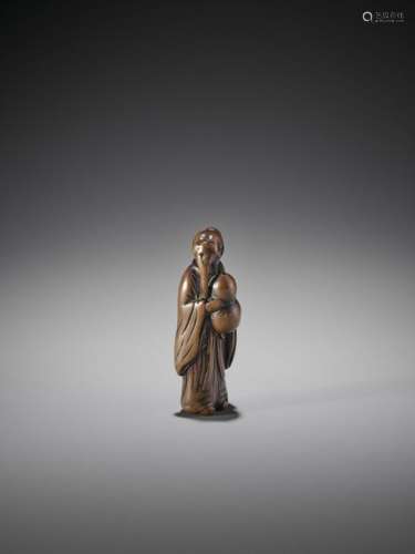 AN EARLY WOOD NETSUKE OF A CHINESE SAGE WITH GOURD…