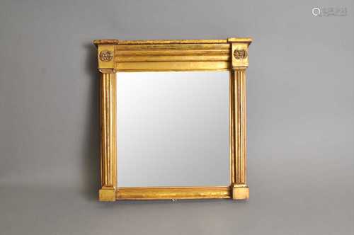 A small 19th century gilded wall mirror, in the Regency style