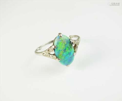 An Art Deco opal and diamond ring
