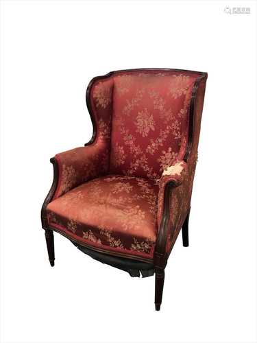 A 19th century French upholstered rosewood framed armchair,