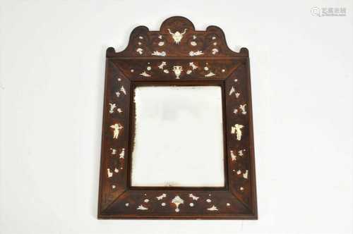 A late 19th century Italian renaissance style wall mirror with an arched cresting, inlaid with mop