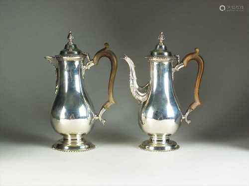 A George III style silver coffee pot and hot water jug