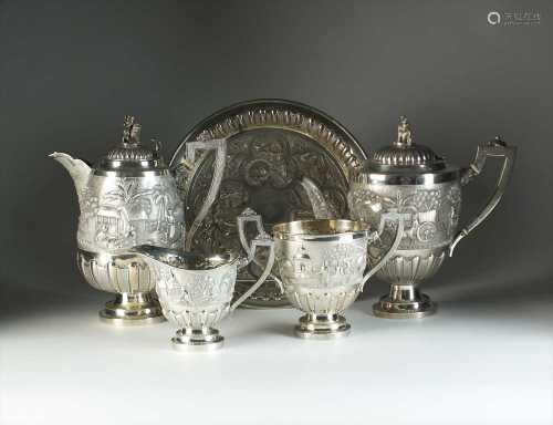 A Burmese white metal four piece coffee service