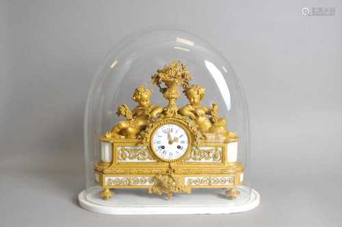 A 19th century French ormolu and white marble mantle clock