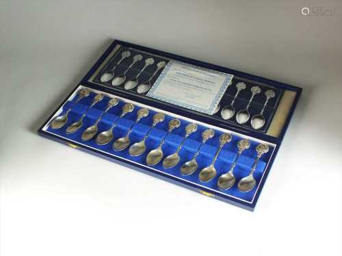 A cased set of twelve silver Zodiac spoons