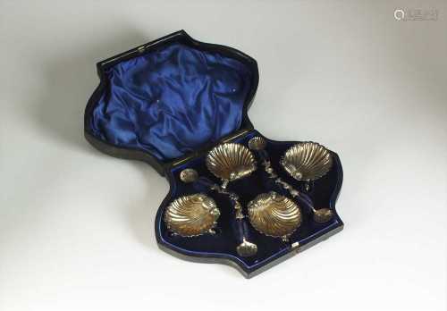 A cased set of four Victorian shell salts and spoons