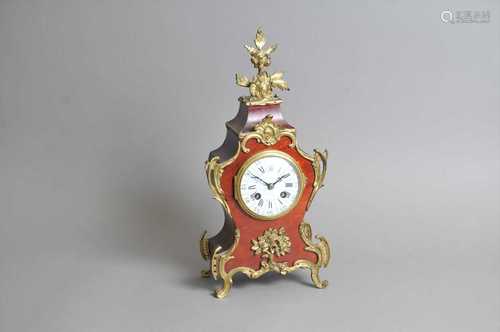 A small simulated boulle mantle clock