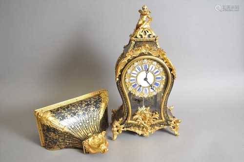 A French Louis XV style boulle marquetry mantel clock and associated bracket