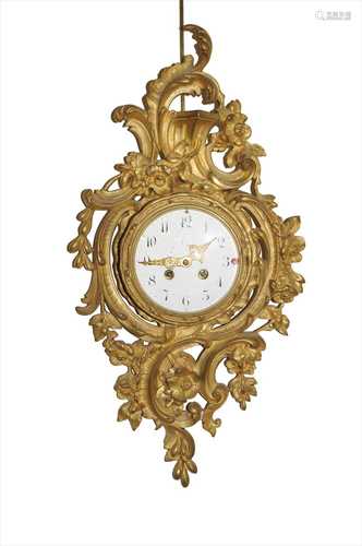 A 19th century French gilt metal framed cartel clock in the Baroque style