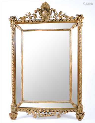 A large 19th century stepped gilt framed wall mirror,