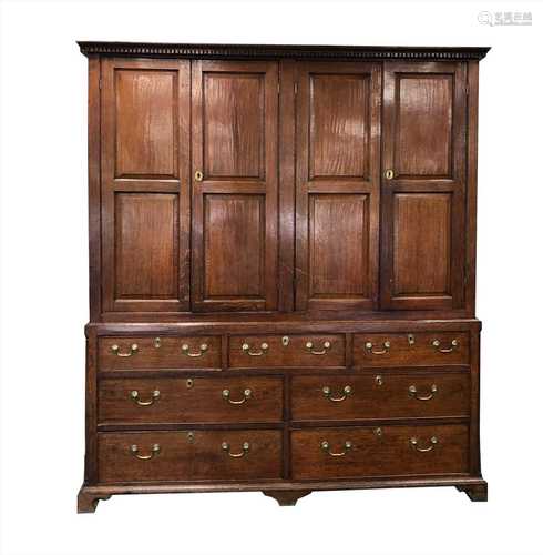 A large 19th century country oak house keeper's cupboard