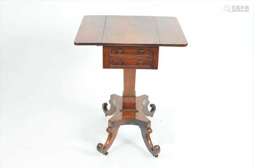 A small Regency rosewood writing table