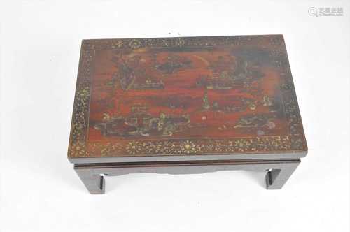 A 19th century Chinese Chinoiserie lacquered low hardwood table