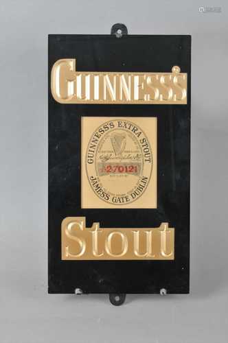 An original 20th century slate backed pub sign advertising Guinness Stout