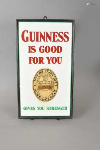 An original 20th century glazed enamel pub sign advertising Guinness