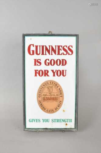 An original 20th century glazed enamel pub sign advertising Guinness