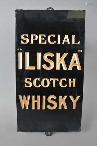 An original slate-backed glass advertising sign for 'Special 