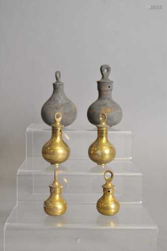 A large collection of polished brass and other globular weights