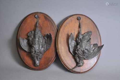 A pair of 19th century cast bronze studies of hanging dead game