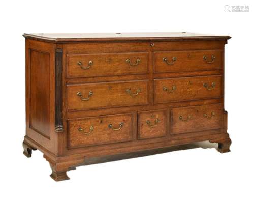 George III oak and mahogany 'Lancashire' mule chest, the hinged crossed banded top over two banks of