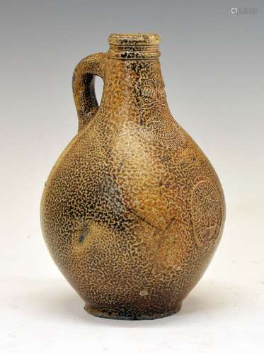 17th Century Continental salt-glazed stoneware Bellarmine jug, of typical bulbous form with