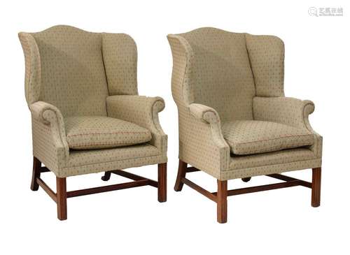 Pair of George III style wing armchairs, each having humped camelback and shaped wings, the out