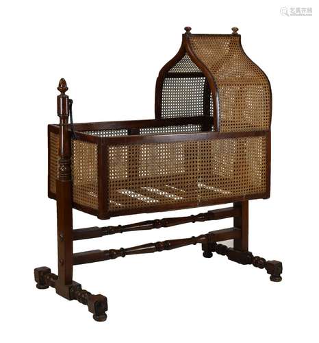 Victorian mahogany and bergere rocking cradle or crib, with caned lancet-arch canopy, rectangular