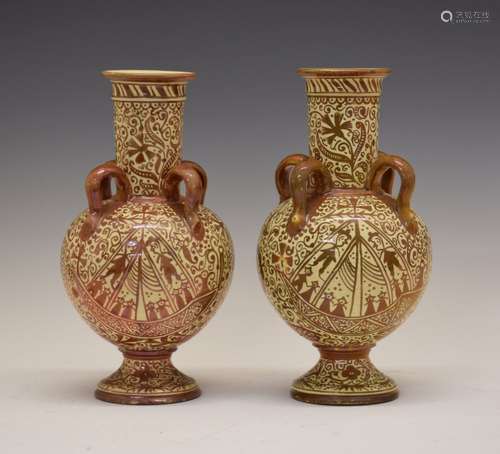 Pair of Hispano/Moresque lustre pottery vases, each of bulbous form with four strap handles to