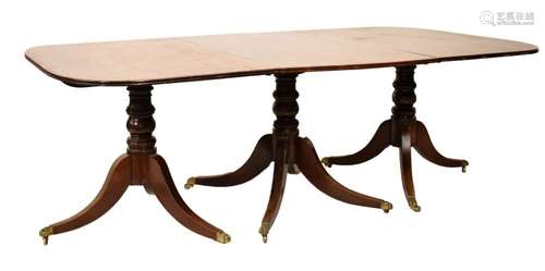 Early 20th Century mahogany triple pedestal dining table in the George III taste, with turned