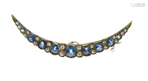 Sapphire and diamond crescent brooch, circa 1900, the graduated oval cuts with pairs of small old