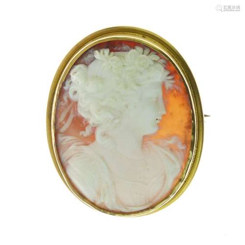 Victorian shell cameo brooch, carved as a classical female in profile, the plain mount tagged '15c',