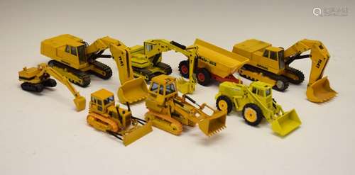 Eight West German NZG Modelle die-cast model construction vehicles comprising: Caterpillar 955