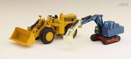 Two West German NZG Modelle die-cast construction models comprising: Caterpillar 988 Digger and