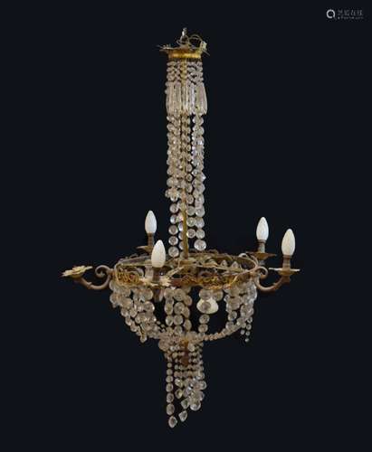 Early 20th Century brass and cut glass chandelier, with scroll-decorated brass frame,