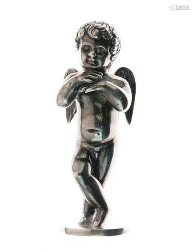 19th Century cast desk seal modelled as a young angel, in standing pose with hands beneath chin,