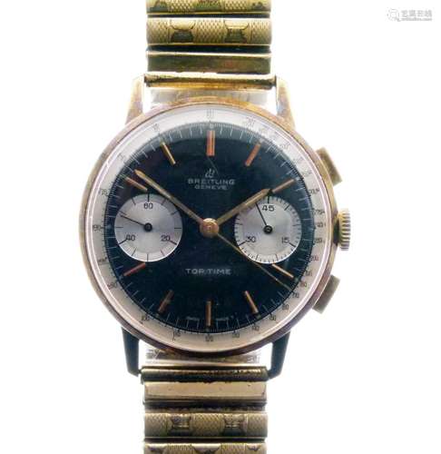 Breitling - Top Time ref: 2003, the gold plated case with signed black reverse panda dial, having