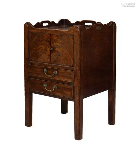 George III mahogany tray-top night cupboard, having a rectangular top with wavy gallery and three