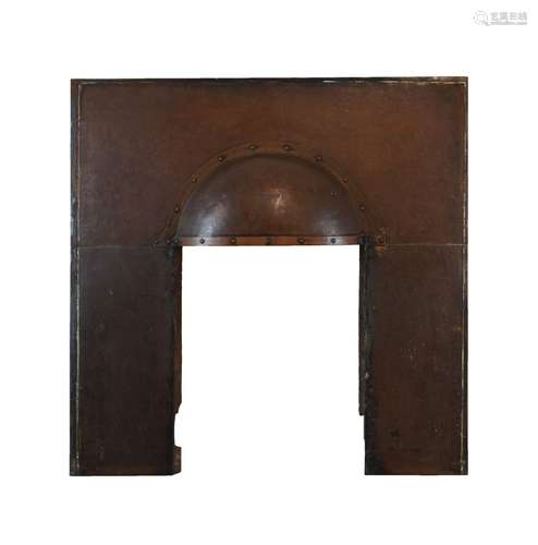 Early 20th Century Arts & Crafts-style copper fire surround, the bow-front canopy with studwork