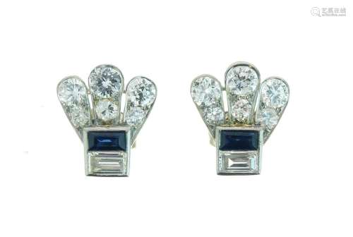 Pair of diamond and sapphire earstuds, the two baguette cuts above a fan below, the fourteen