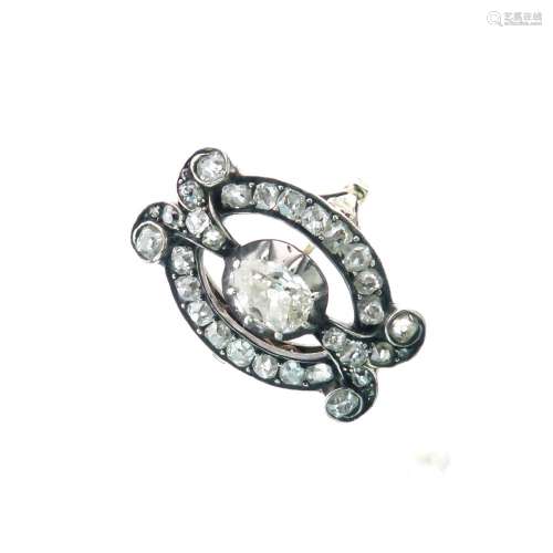Late 19th Century diamond ring, the central silver collet set pendeloque cut stone of