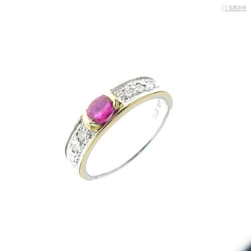 Ruby and diamond platinum dress ring, the oval cut with a trio of small brilliant cuts to each