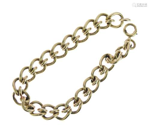 9ct gold bracelet, of solid curb link links, 21.5cm long, 43g gross Condition: Links approx 12mm