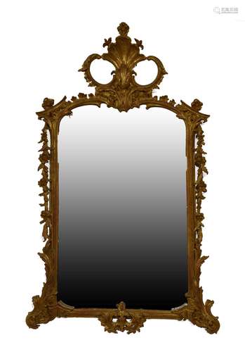 20th Century Chippendale Revival giltwood and gesso wall mirror, the plain plate within foliate