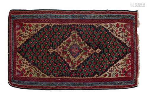 Mid 20th Century flat-woven kilim rug, the sand-coloured field with large hexagonal indigo-ground