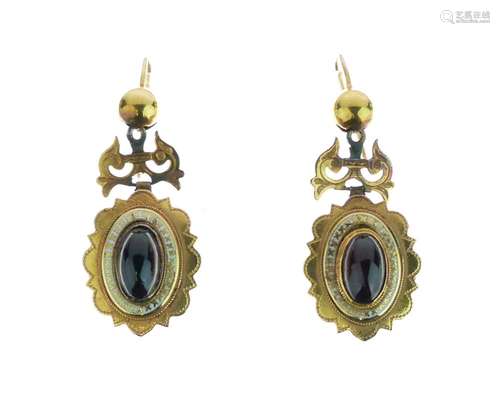 Pair of Victorian garnet and enamel drop earrings, with a scroll top fitting Condition: Unmarked