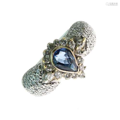 Sapphire and diamond dress ring, stamped '18k' and 'PT900', the pendeloque cut sapphire enclosed